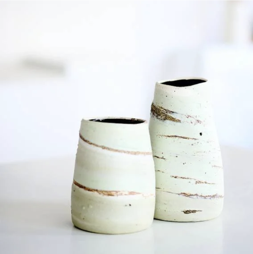 Sårbar grøn vase